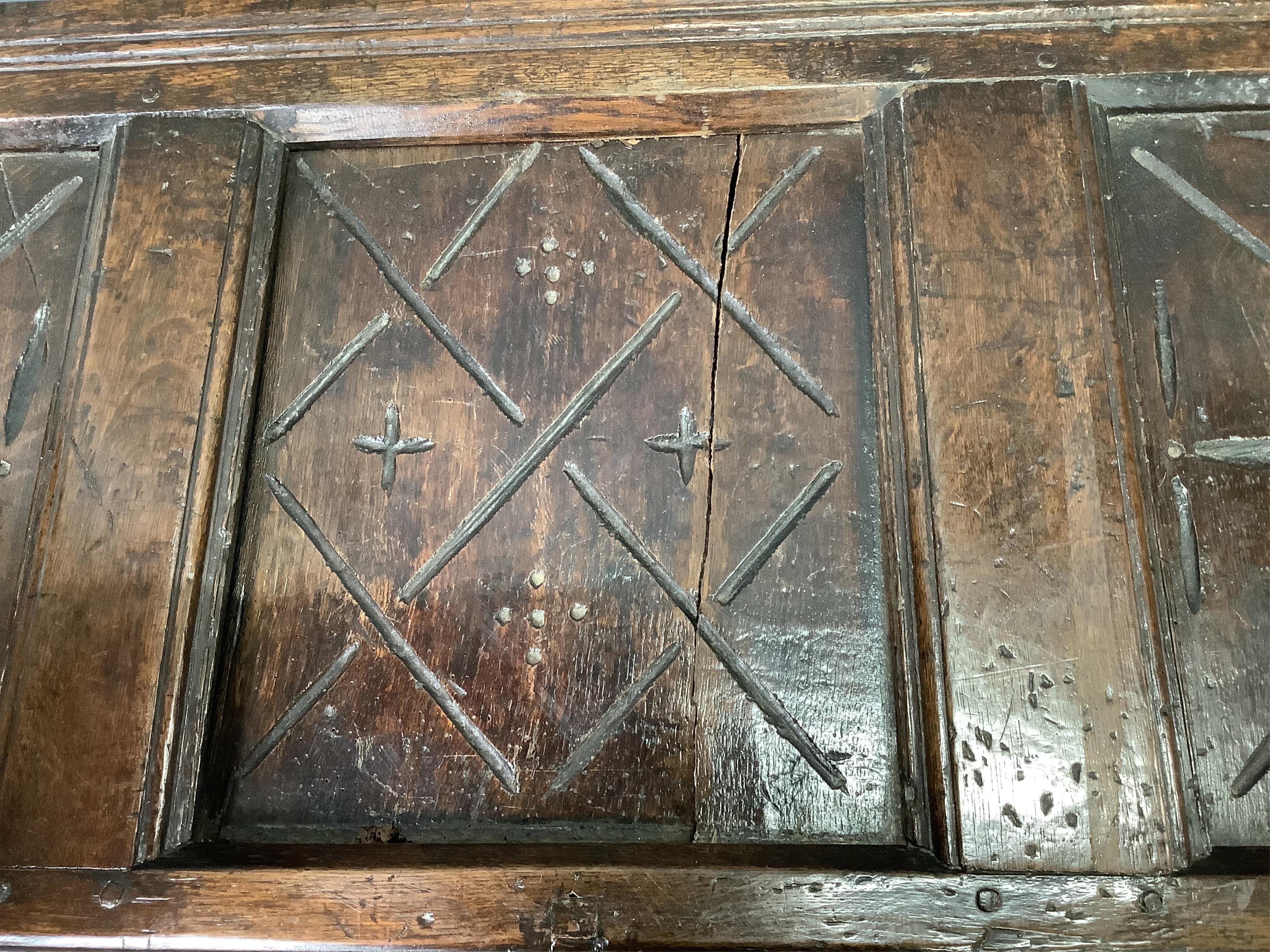 An early 18th century and later oak coffer, width 132cm, height 58cm. Condition - poor